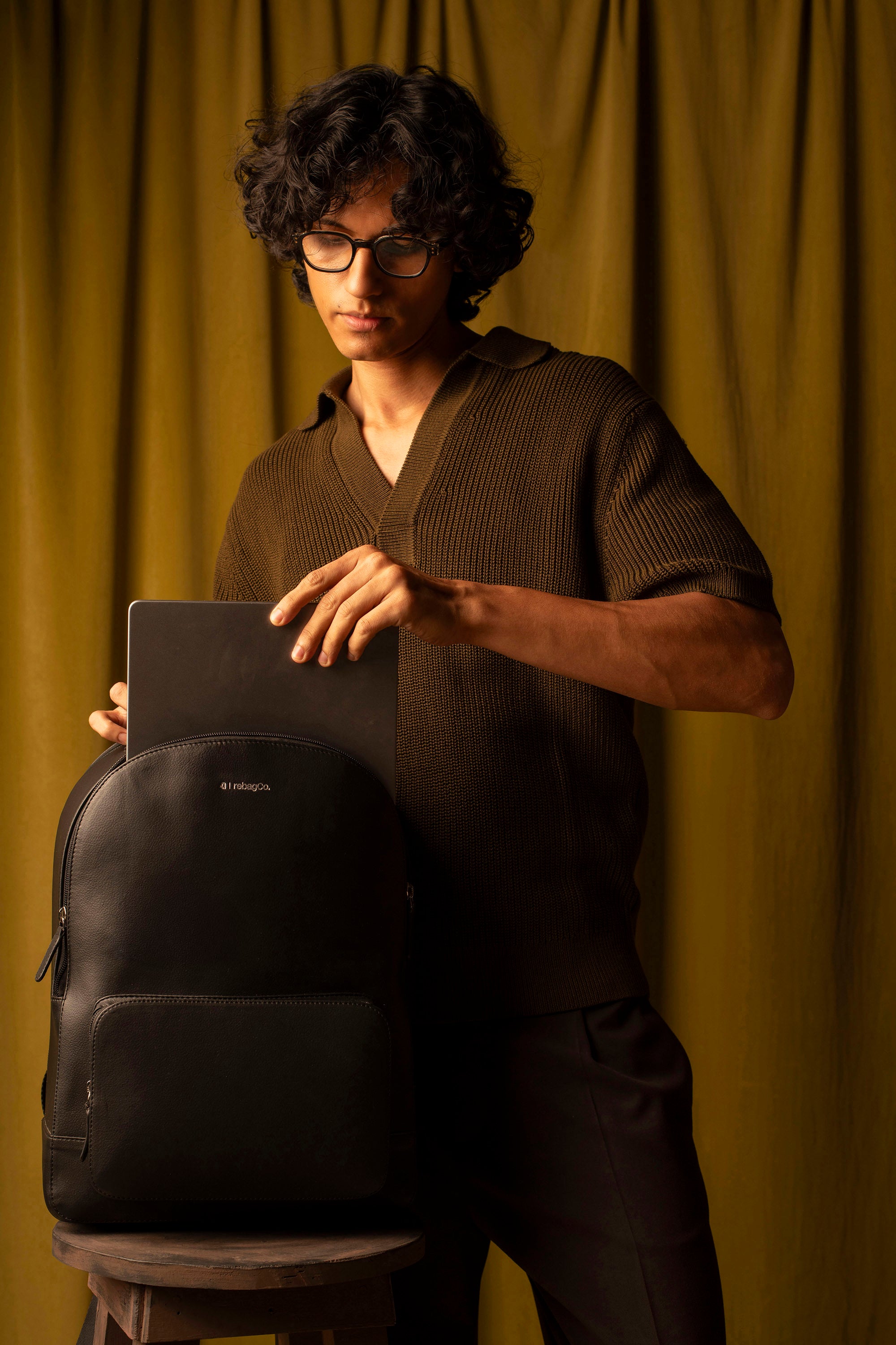 RebagCo Classic Requirement Backpack black – lifestyle flat lay